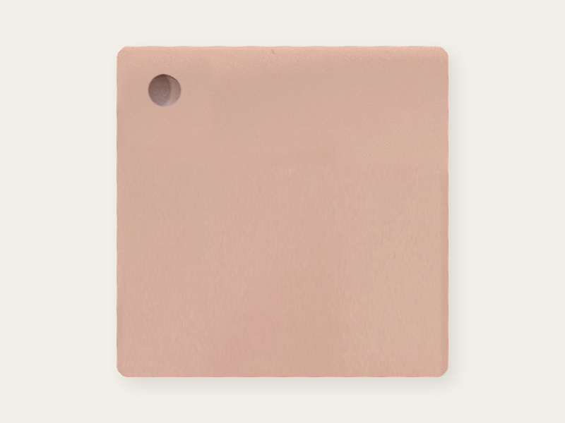 Matte-side photograph of Powder Peach opaque DAMOYE pastel cast acrylic.