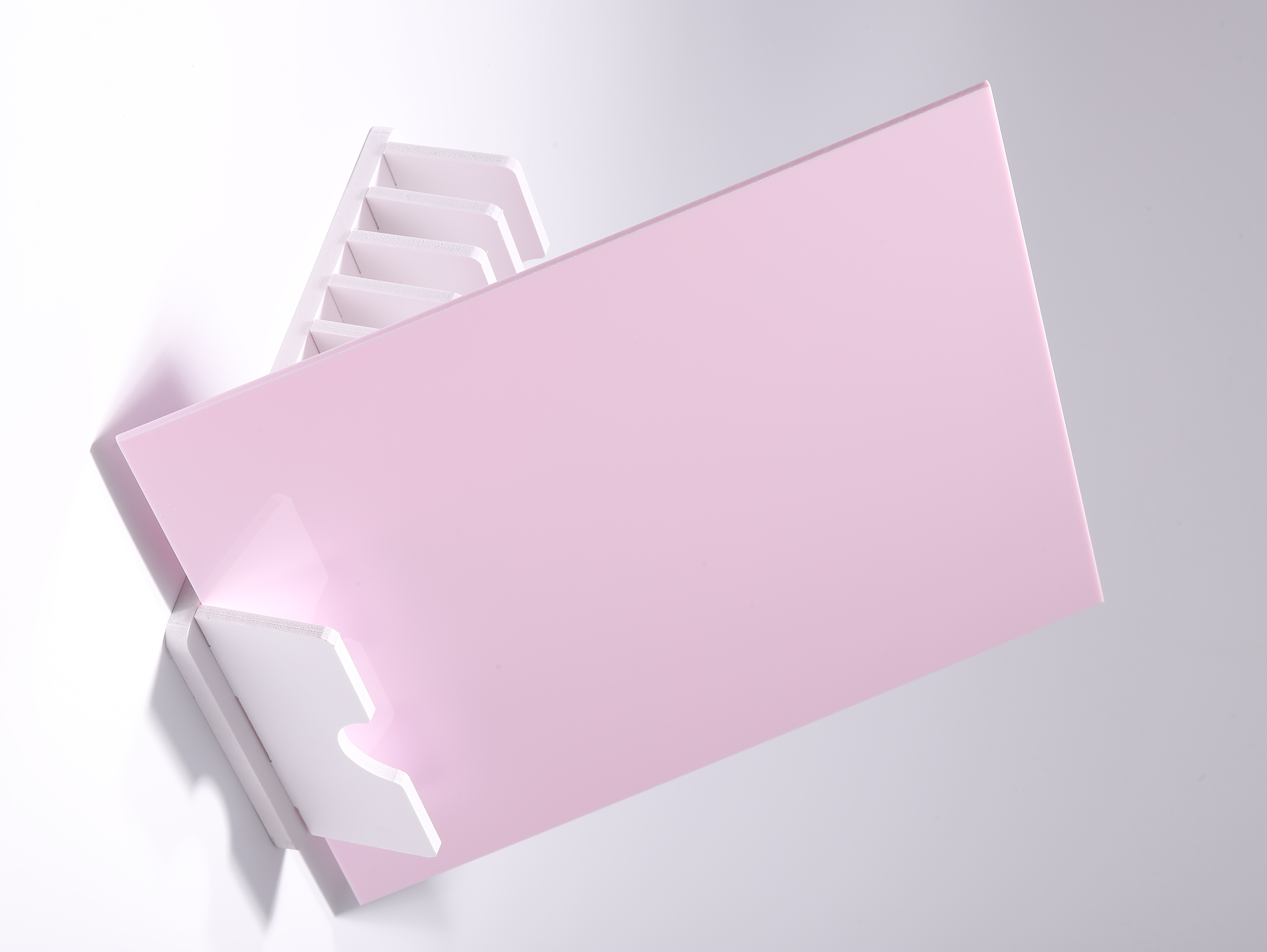 Studio photograph of a Strawberry Milk opaque DAMOYE pastel cast acrylic sheet.