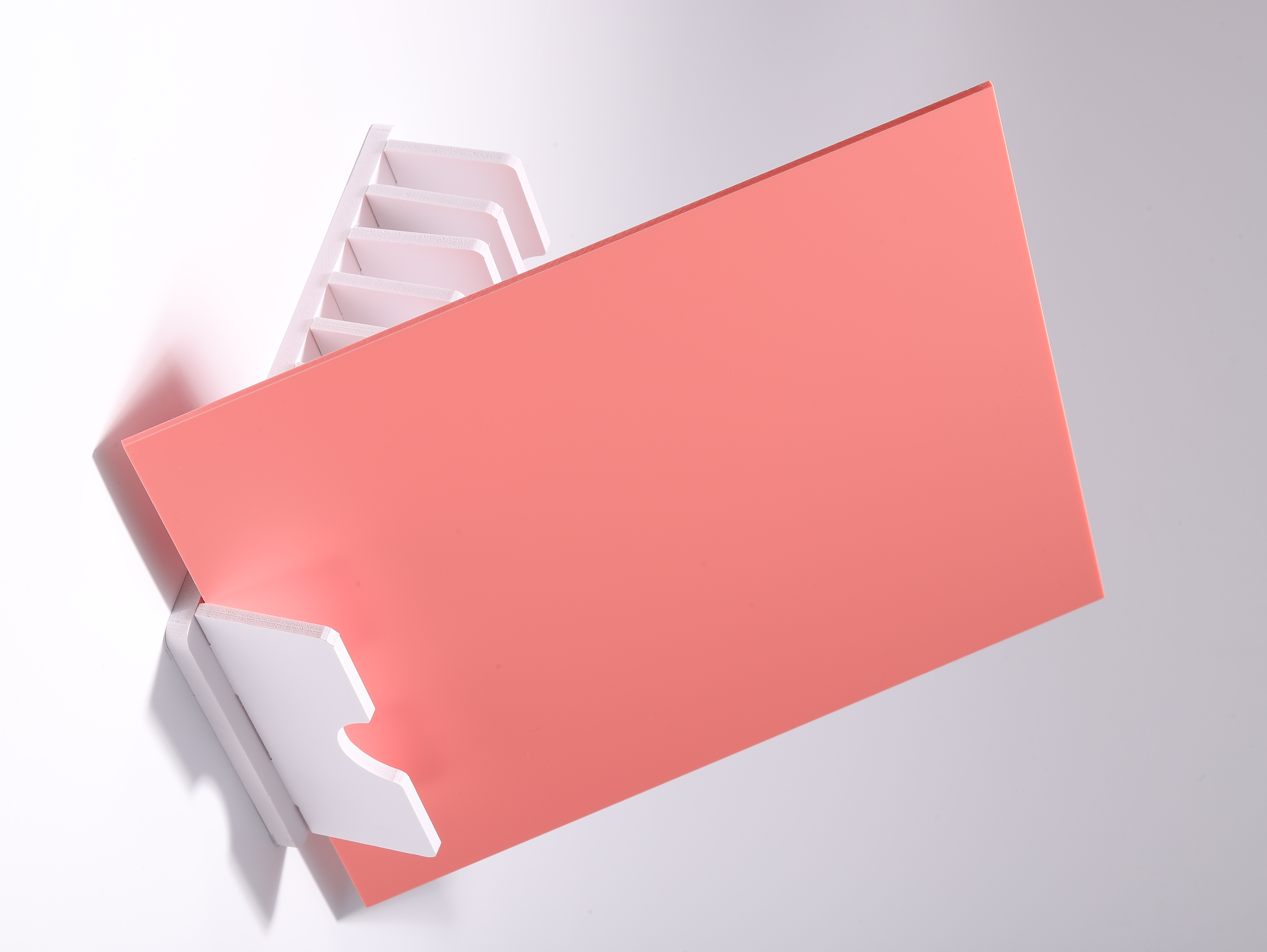 Studio photograph of a Watermelon opaque DAMOYE pastel cast acrylic sheet.
